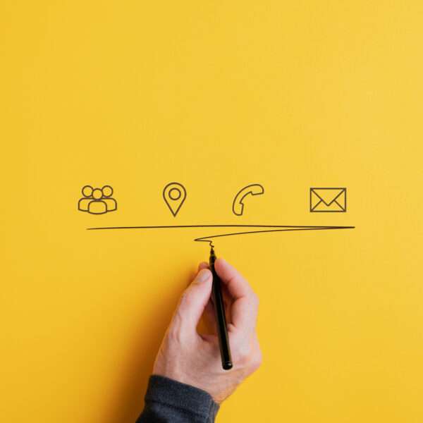 Contact and communication icons on yellow background